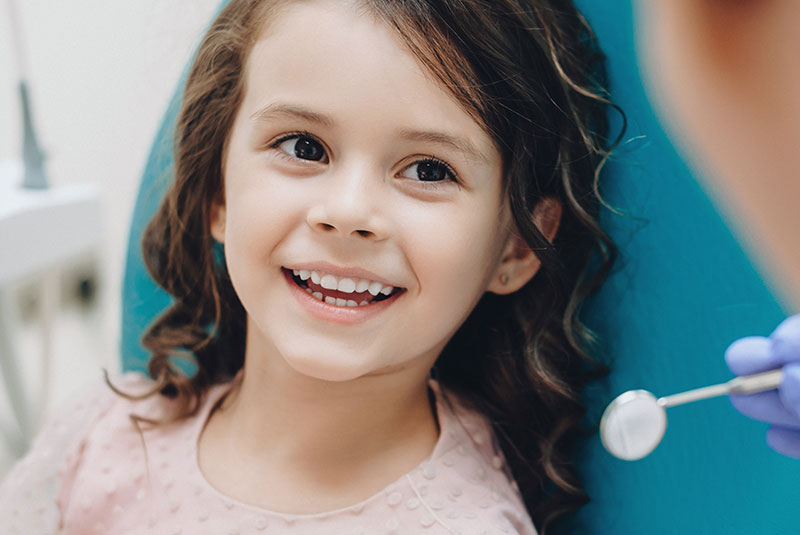 child at the dental center for dental treatment