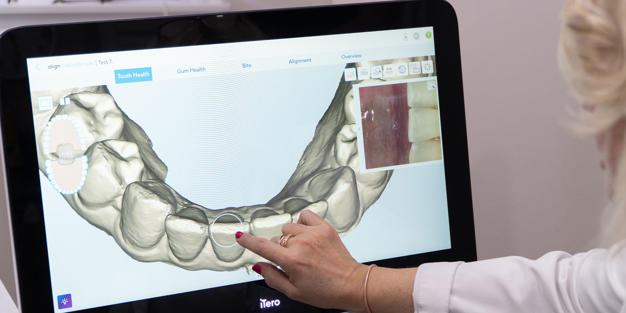 doctor examining patient for dental procedure